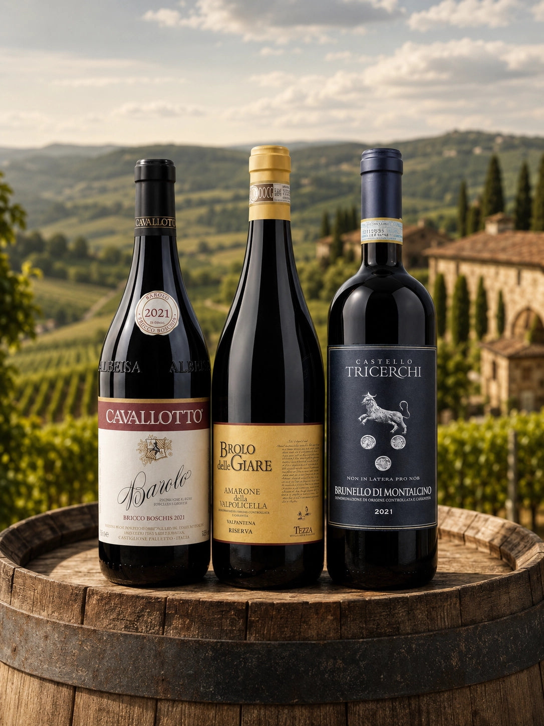 Three iconic Italian red wine bottles — Barolo Cavallotto, Amarone Brolo delle Giare Riserva, and Brunello di Montalcino Castello Tricerchi — displayed on a wooden barrel with a vineyard landscape in the background.